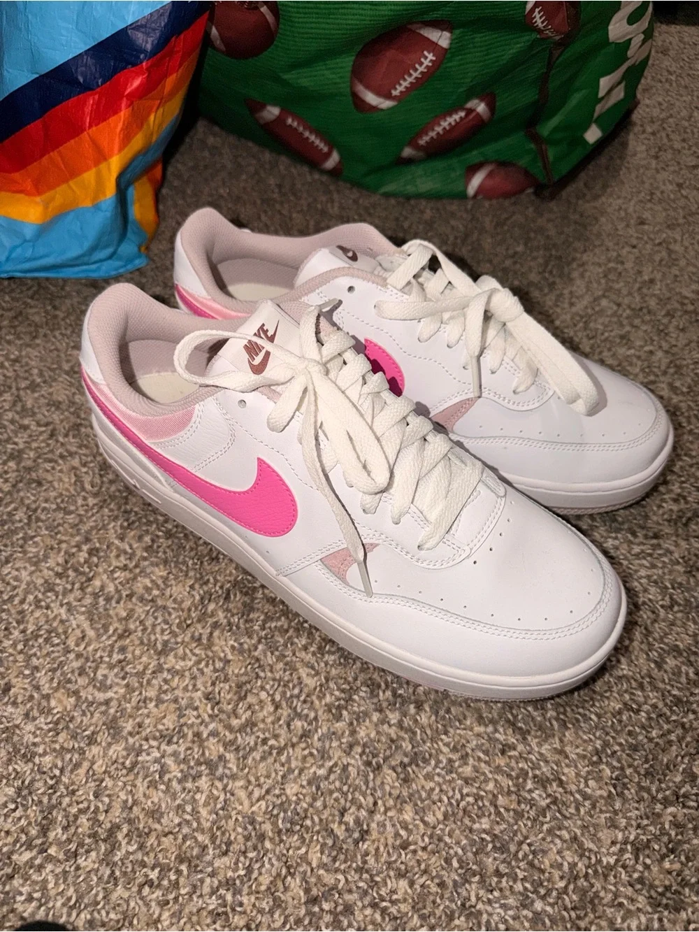 Nike Women’s White Sneakers with Pink Swoosh and Pale Pink Accents